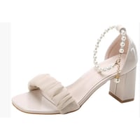 This summer's new and stunning design of pleated, thick-heeled, square-toed, one-shoulder sandals with a shallow toe